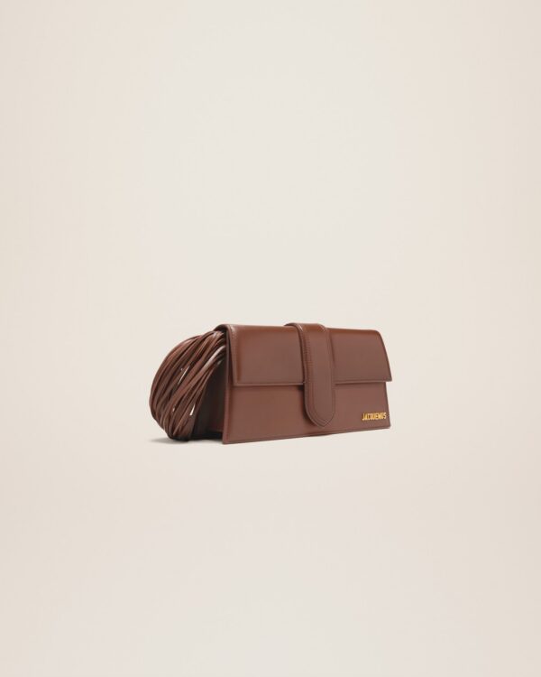 23E231BA051-3108-850_11.jpg Jacquemus Le Bambino long Ficiu Strand strap flap bag.