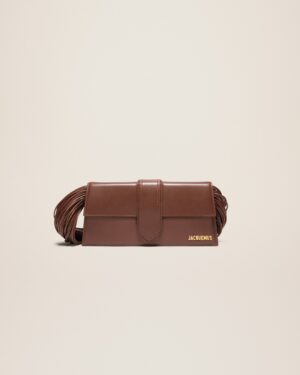 23E231BA051-3108-850_1_main.jpg Jacquemus Le Bambino long Ficiu Strand strap flap bag.