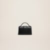 23E231SL036-3060-990_12.jpg Jacquemus Le petit Bambino Mini flap bag.