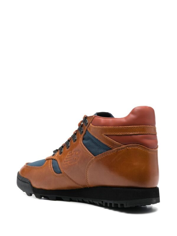 19775368_44295466_1000.jpg New Balance debossed-logo hi-top sneakers