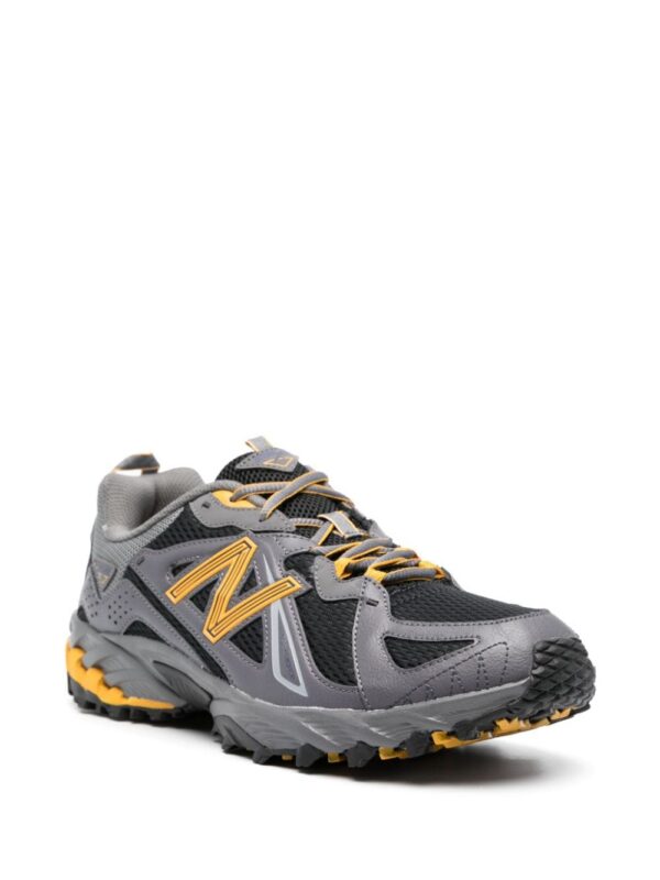 21352373_51535093_1000.jpg New Balance 610v1 leather sneakers