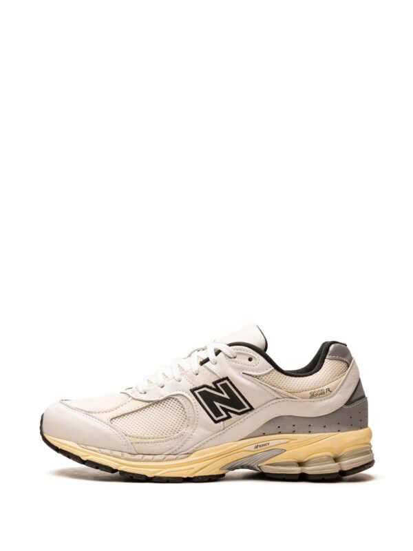 21586650_52310677_1000.jpg New Balance x thisisneverthat 2002R sneakers