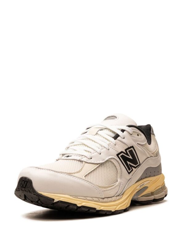21586650_52310691_1000.jpg New Balance x thisisneverthat 2002R sneakers