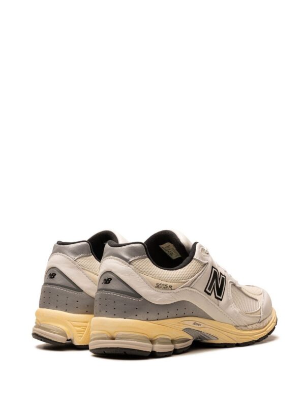 21586650_52310697_1000.jpg New Balance x thisisneverthat 2002R sneakers