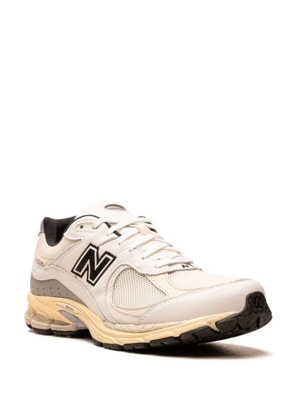 21586650_52310705_1000.jpg New Balance x thisisneverthat 2002R sneakers