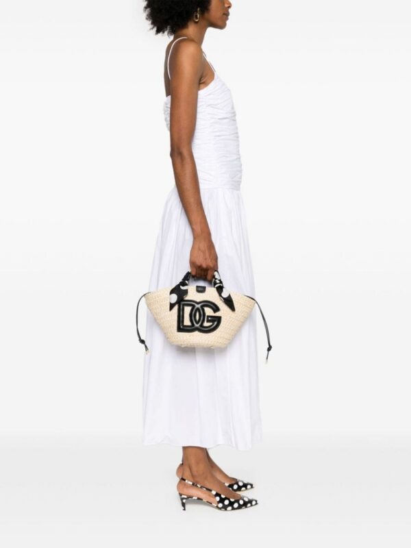 24038234_54164490_1000.jpg Dolce & Gabbana logo-appliqué straw bucket bag