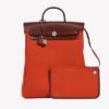 2681_Hermes_Herbag_Backpack_Oran3_400x_1c1d3c17-bdfd-4ecd-a785-3eb62672a422.jpg Hermès Herbag a Dos Backpack in Orange Mècano Toile and Rouge H Vache Hunter Leather bag