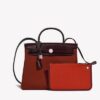 2683_Hermes_Herbag_31_Cuivre-Ora3_400x_ffc57def-47ca-4c7e-a3c6-93696eda7f02.jpg Hermès Herbag 31 in Cuivre Toile and Rouge Sellier Vache Hunter Leather with Palladium Hardware bag