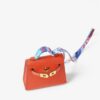 C_400x_fc9a90e1-c7cd-478d-a62e-a17916278b53.jpg Hermès Kelly Twilly Bag Charm with Printed Silk Strap bag