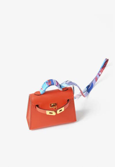 C_400x_fc9a90e1-c7cd-478d-a62e-a17916278b53.jpg Hermès Kelly Twilly Bag Charm with Printed Silk Strap bag