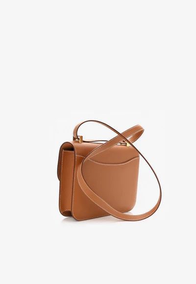 Epsom_20Constance_201-24_20Gold_202_400x_d21dfb70-8a97-4f64-b82b-70f0725ee555.jpg Hermès Constance 1-24 in Gold Epsom with Gold Hardware bag