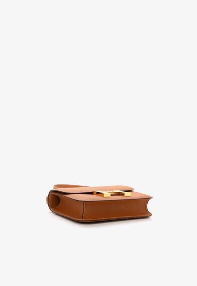 Epsom_20Constance_201-24_20Gold_203_400x_f3787bb9-1277-4b1c-b977-cde5710cb711.jpg Hermès Constance 1-24 in Gold Epsom with Gold Hardware bag