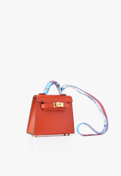 F_400x_620664d1-4d69-4253-b4d4-82a27c83cb3a.jpg Hermès Kelly Twilly Bag Charm with Printed Silk Strap bag