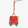 hermescapucinejaunedenaplesvertvertigoandbluezanzibartadelaktandchevrequelleidolekellydollbagcharmpalladiumhardware2021_400x_a4fd2687-be87-49fc-98b0-2add86b5d8b9.jpg Hermès Kelly Quelle Idole Bag Charm in Capucine, Jaune De Naples, Vert Vertigo and Zanzibar Tadelakt and Chèvre Mysore bag